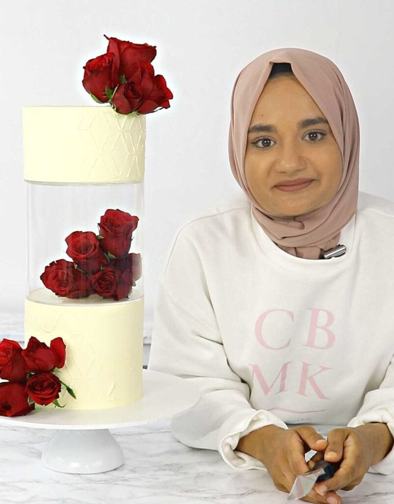 A picture of Maryam Khan with a trending see through cake