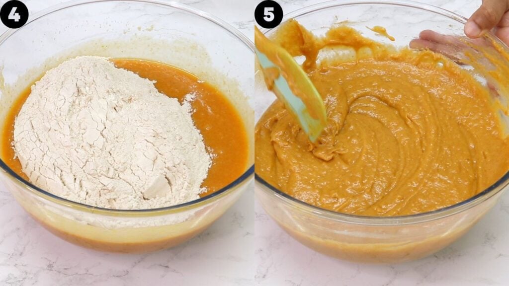 pumpkin bundt cake - Cakes by MK Step 4: a mound of flour resting on top of orange batter in a glass mixing bowl, ready to be stirred.