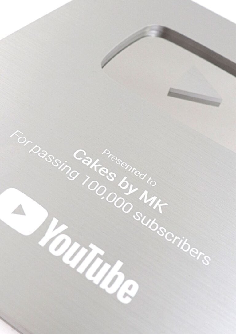 Close-up of a YouTube subscription confirmation card with the channel name 'Cakes by MK' and a 'Subscribed' badge.